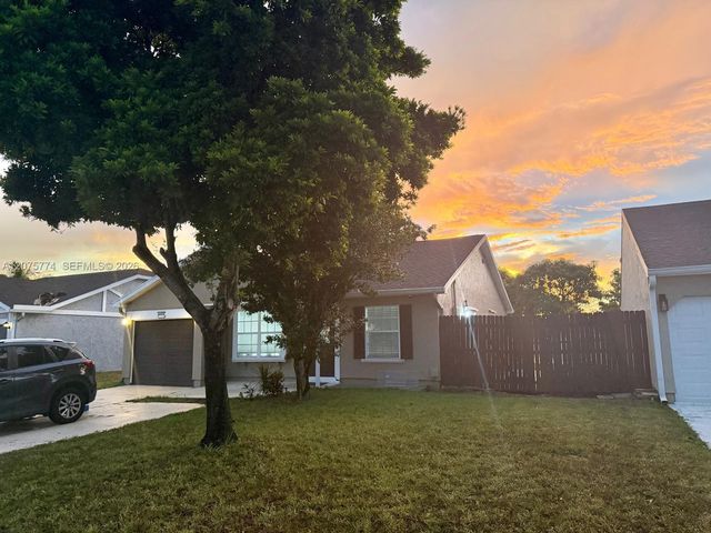 22979 Sandalfoot Boulevard, Boca Raton, FL 33428