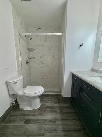 22979 Sandalfoot Boulevard, Boca Raton, FL 33428