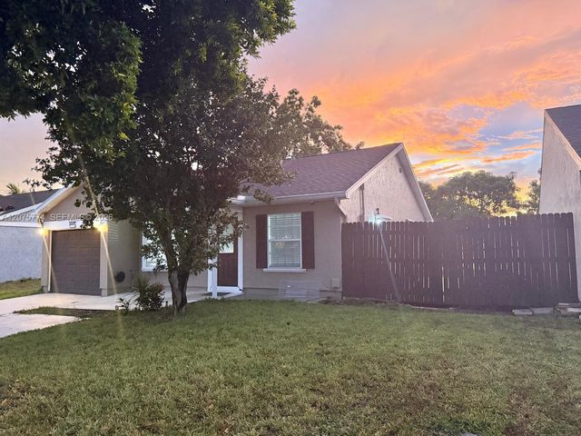 22979 Sandalfoot Boulevard, Boca Raton, FL 33428