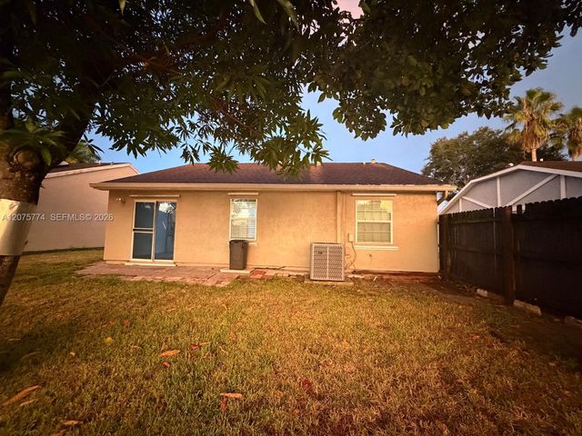 22979 Sandalfoot Boulevard, Boca Raton, FL 33428