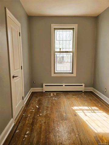 30-32 84th Street, East Elmhurst, NY 11370