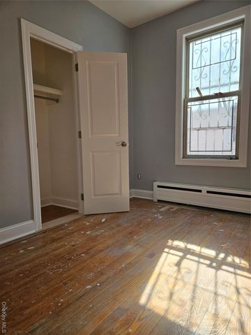 30-32 84th Street, East Elmhurst, NY 11370