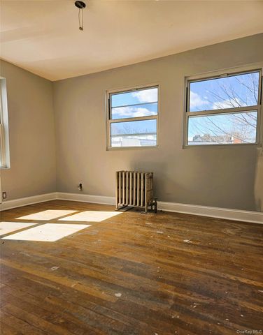 30-32 84th Street, East Elmhurst, NY 11370