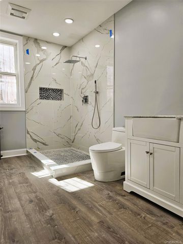 30-32 84th Street, East Elmhurst, NY 11370