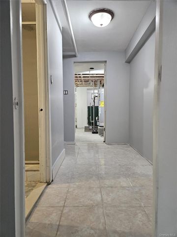 30-32 84th Street, East Elmhurst, NY 11370