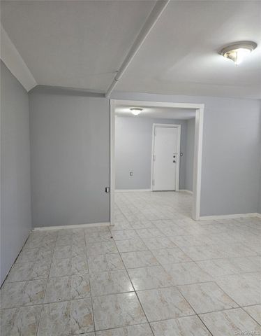 30-32 84th Street, East Elmhurst, NY 11370