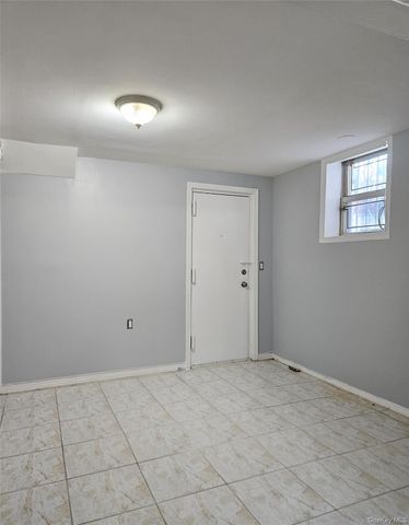 30-32 84th Street, East Elmhurst, NY 11370