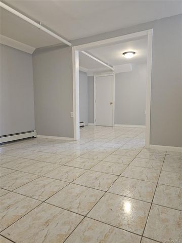 30-32 84th Street, East Elmhurst, NY 11370