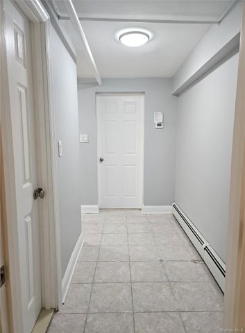 30-32 84th Street, East Elmhurst, NY 11370