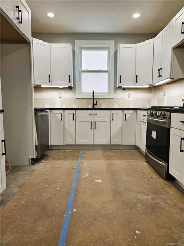 30-32 84th Street, East Elmhurst, NY 11370