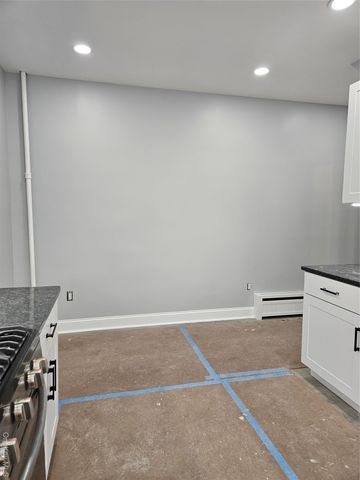 30-32 84th Street, East Elmhurst, NY 11370