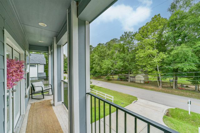 725 Magnolia Point Drive, Houston, TX 77336