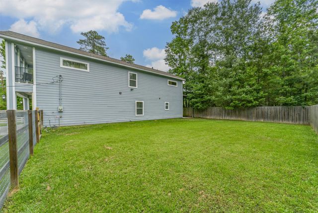 725 Magnolia Point Drive, Houston, TX 77336