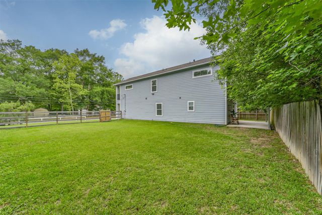 725 Magnolia Point Drive, Houston, TX 77336