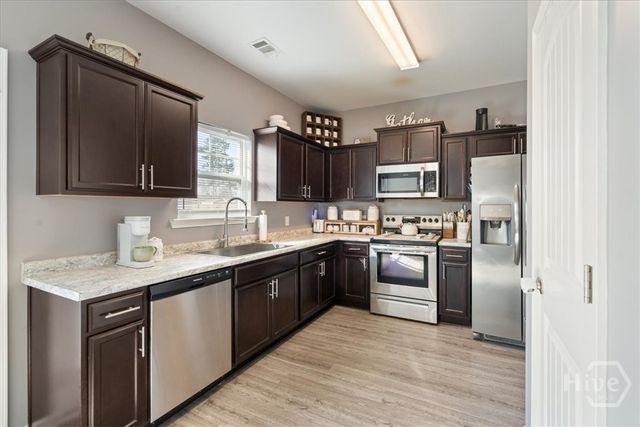 140 Mattie Belle Davis Street, Ellabell, GA 31308