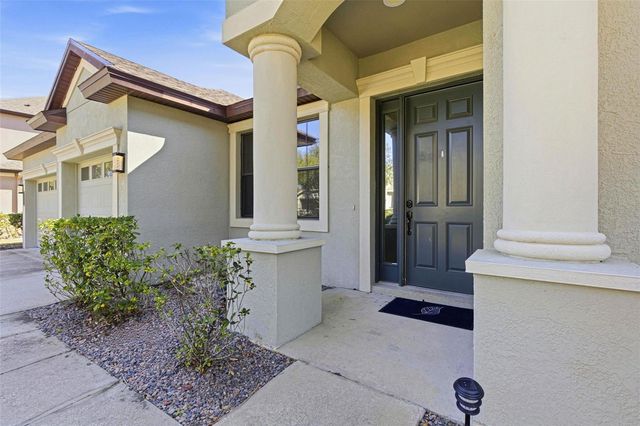 7907 HAMPTON LAKE DRIVE, Tampa, FL 33647