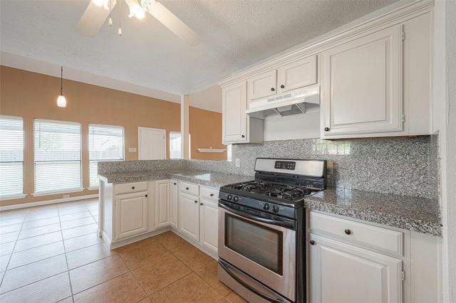 703 Turtle Creek Drive, Missouri City, TX 77489