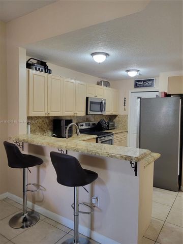 10653 SW 8th St 2407, Pembroke Pines, FL 33025
