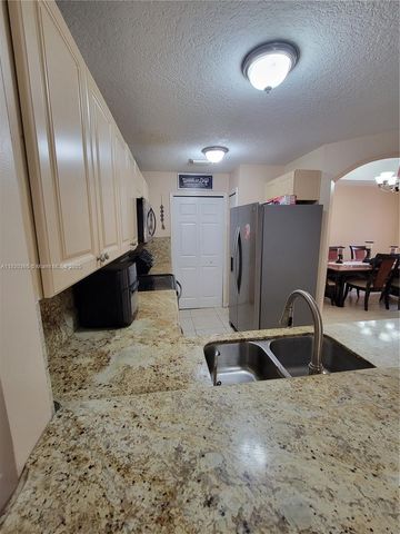 10653 SW 8th St 2407, Pembroke Pines, FL 33025