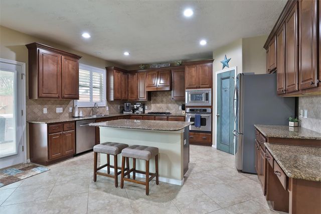6931 Lotus Creek Court, Spring, TX 77379