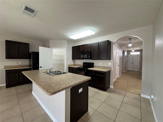 560 LAKE CUMMINGS WAY, Lake Alfred, FL 33850