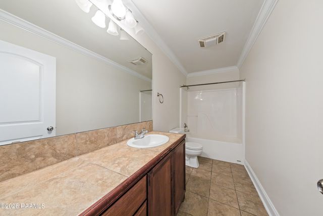 709 Copper Meadow Boulevard, Youngsville, LA 70592