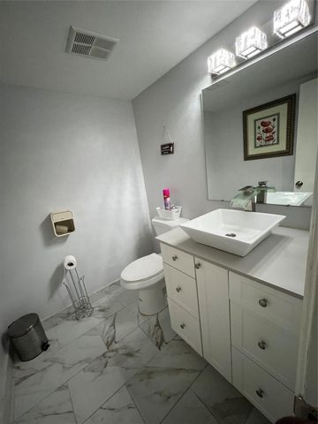 16 Spinning Wheel Lane, Tamarac, FL 33319