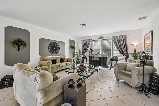 2415 WESTMONT Drive, Royal Palm Beach, FL 33411