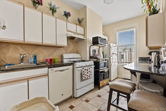 79-27 67th Drive, Middle Village, NY 11379