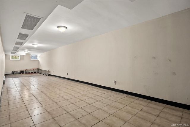 79-27 67th Drive, Middle Village, NY 11379