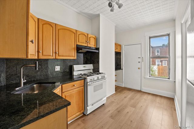 79-27 67th Drive, Middle Village, NY 11379