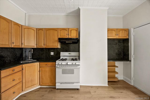 79-27 67th Drive, Middle Village, NY 11379