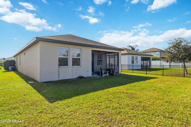 719 Ladyfish Lane, New Smyrna Beach, FL 32168