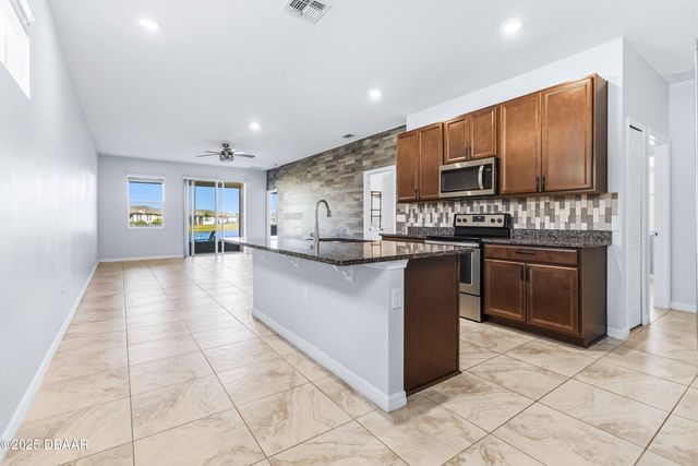 719 Ladyfish Lane, New Smyrna Beach, FL 32168