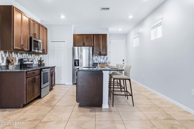 719 Ladyfish Lane, New Smyrna Beach, FL 32168