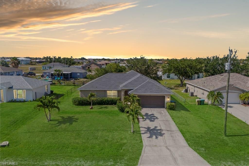 927 NW 12th TER, CAPE CORAL, FL 33993 — photo 2