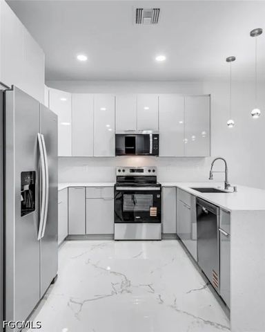 407 Columbus AVE, Lehigh Acres, FL 33972