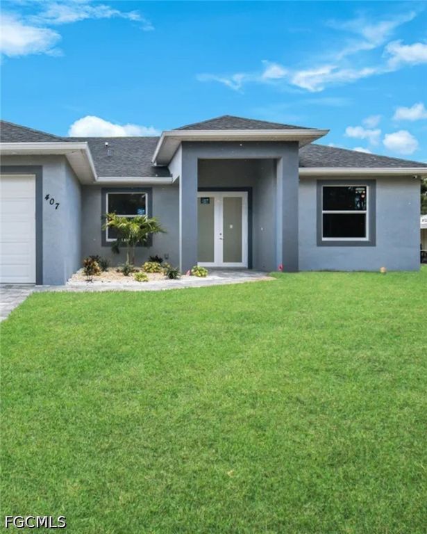 407 Columbus AVE, Lehigh Acres, FL 33972