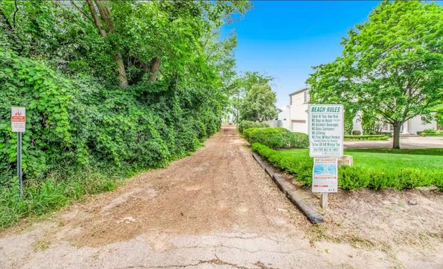 48103 Walnut Avenue, Grand Beach Vllg, MI 49117