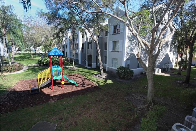 11133 SW 8th St 102, Pembroke Pines, FL 33025