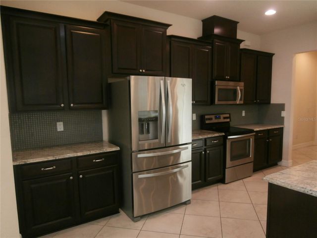 13172 WOODFORD STREET, Orlando, FL 32832