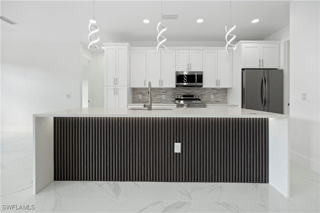 918 Hollister AVE, Lehigh Acres, FL 33974