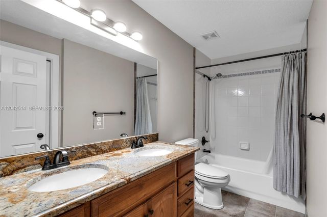 5703 Lago Del Sol Drive, Lake Worth, FL 33449