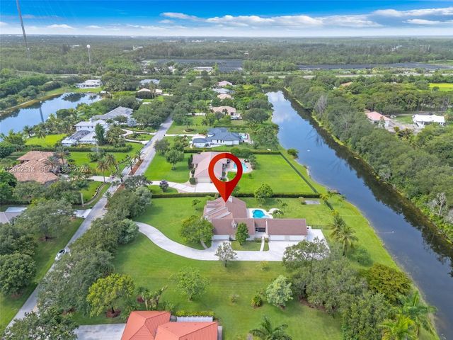 5703 Lago Del Sol Drive, Lake Worth, FL 33449