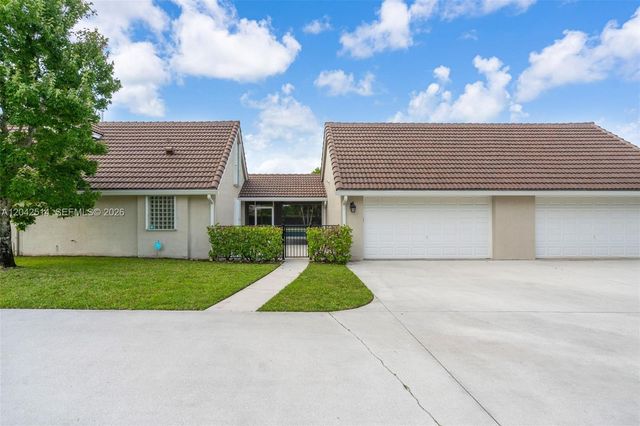 5703 Lago Del Sol Drive, Lake Worth, FL 33449