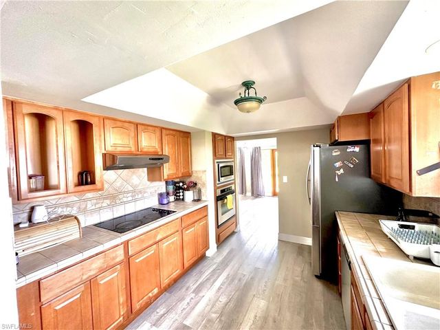 416 Bristle Cone LN 9, Naples, FL 34113