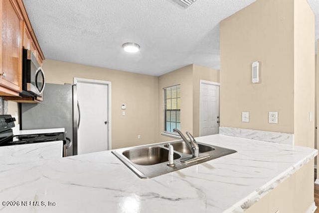 7705 HIGHCHAIR Lane, Jacksonville, FL 32210