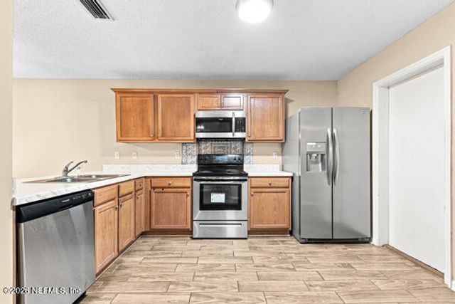 7705 HIGHCHAIR Lane, Jacksonville, FL 32210