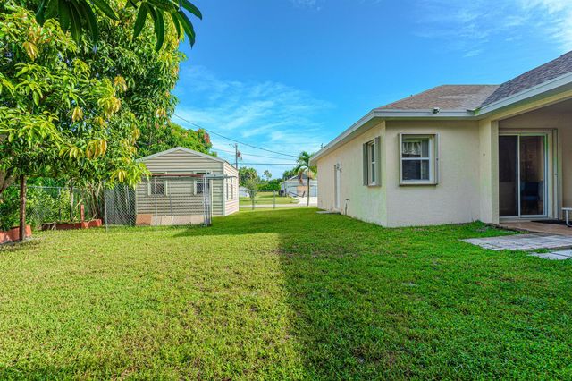 1518 SW Hutchins Street, Port St. Lucie, FL 34983