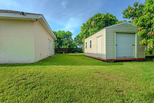 1518 SW Hutchins Street, Port St. Lucie, FL 34983